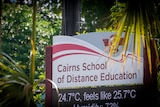 Sign at Cairns School of Distance Education surrounded by trees