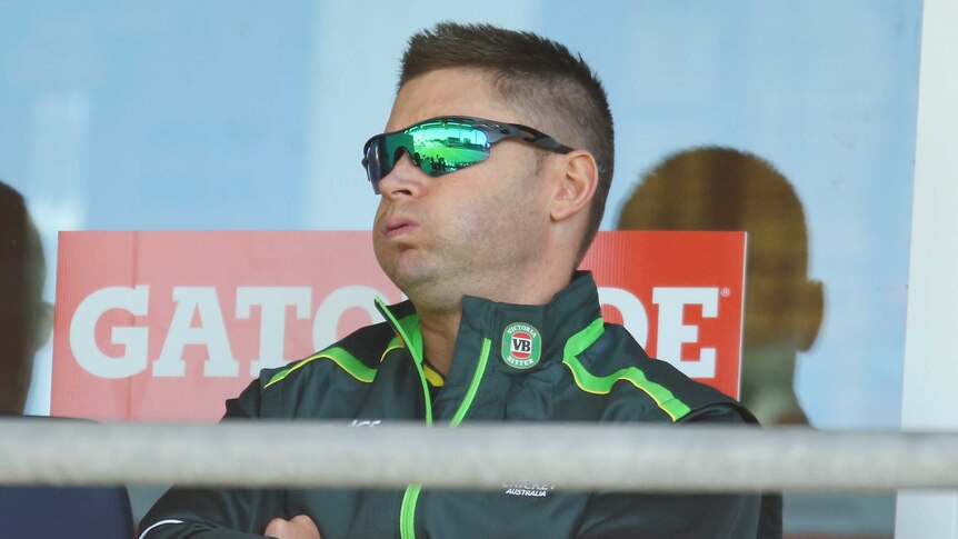 Michael Clarke looks on as he sits out of ODI with hamstring injury