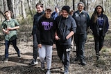 Greater Bendigo National Park provides the backdrop to Year 10 students walking through the bush.