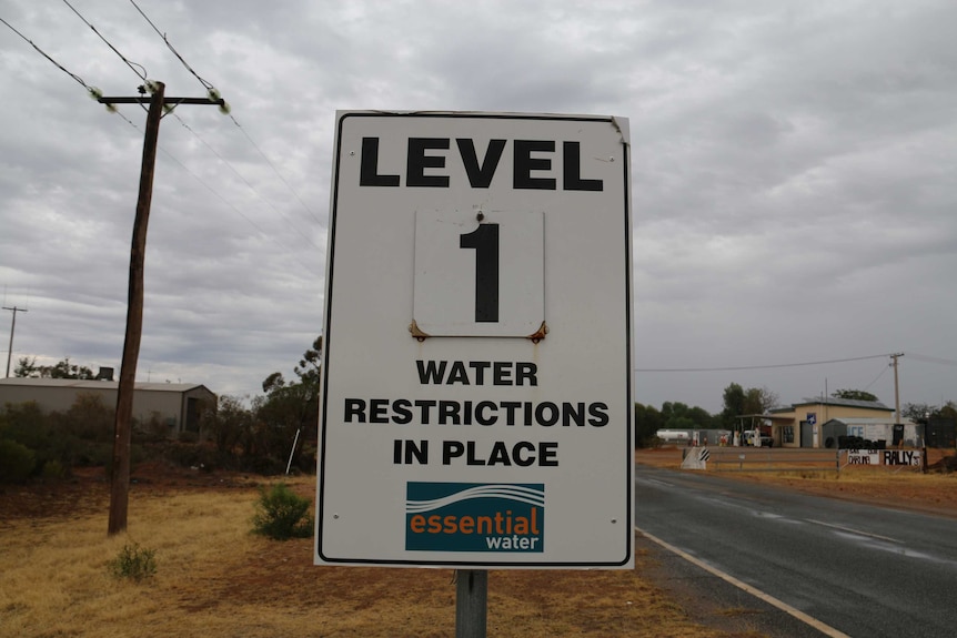 Signage in Menindee, NSW showing level 1 water restrictions.
