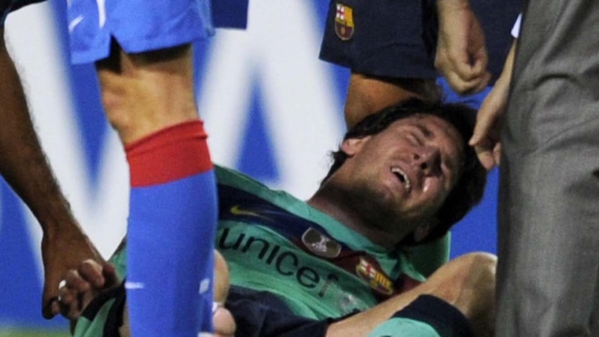 Messi was clearly in pain after the late challenge.