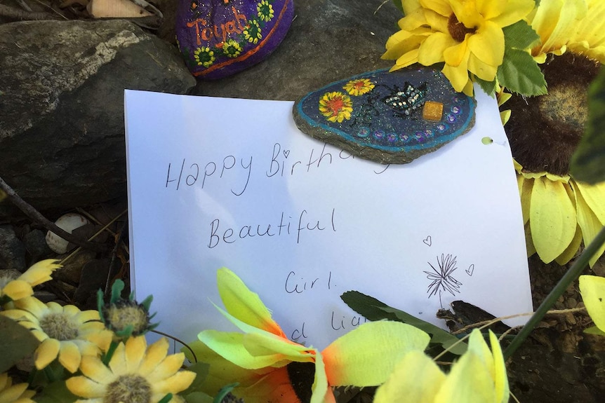 Birthday message at the place a young woman was killed