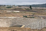 Millions of dollars has been spent cleaning up asbestos contaminated material at the North Weston Ponds project .