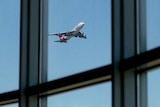 A Qantas jumbo jet takes off