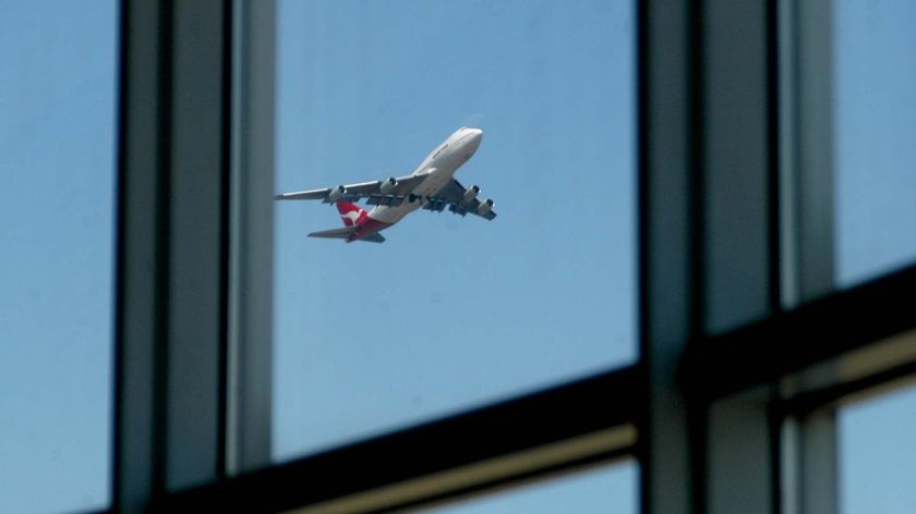 A jumbo jet takes off