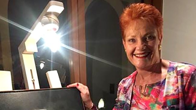 Pauline Hanson with a portrait of Robert Menzies