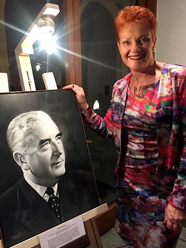 Pauline Hanson with a portrait of Robert Menzies