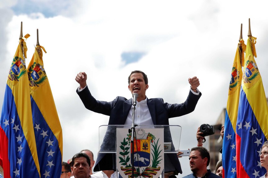 Juan Guaido reacts during a rally against Venezuelan President Nicolas Maduro's government.