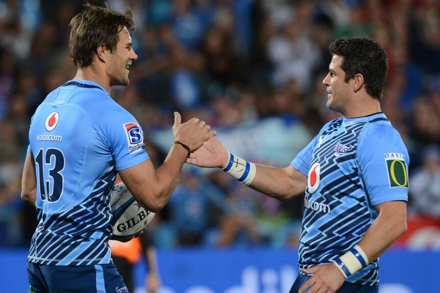 Try time ... JJ Engelbrecht (L) celebrates a five-pointer with Morne Steyn