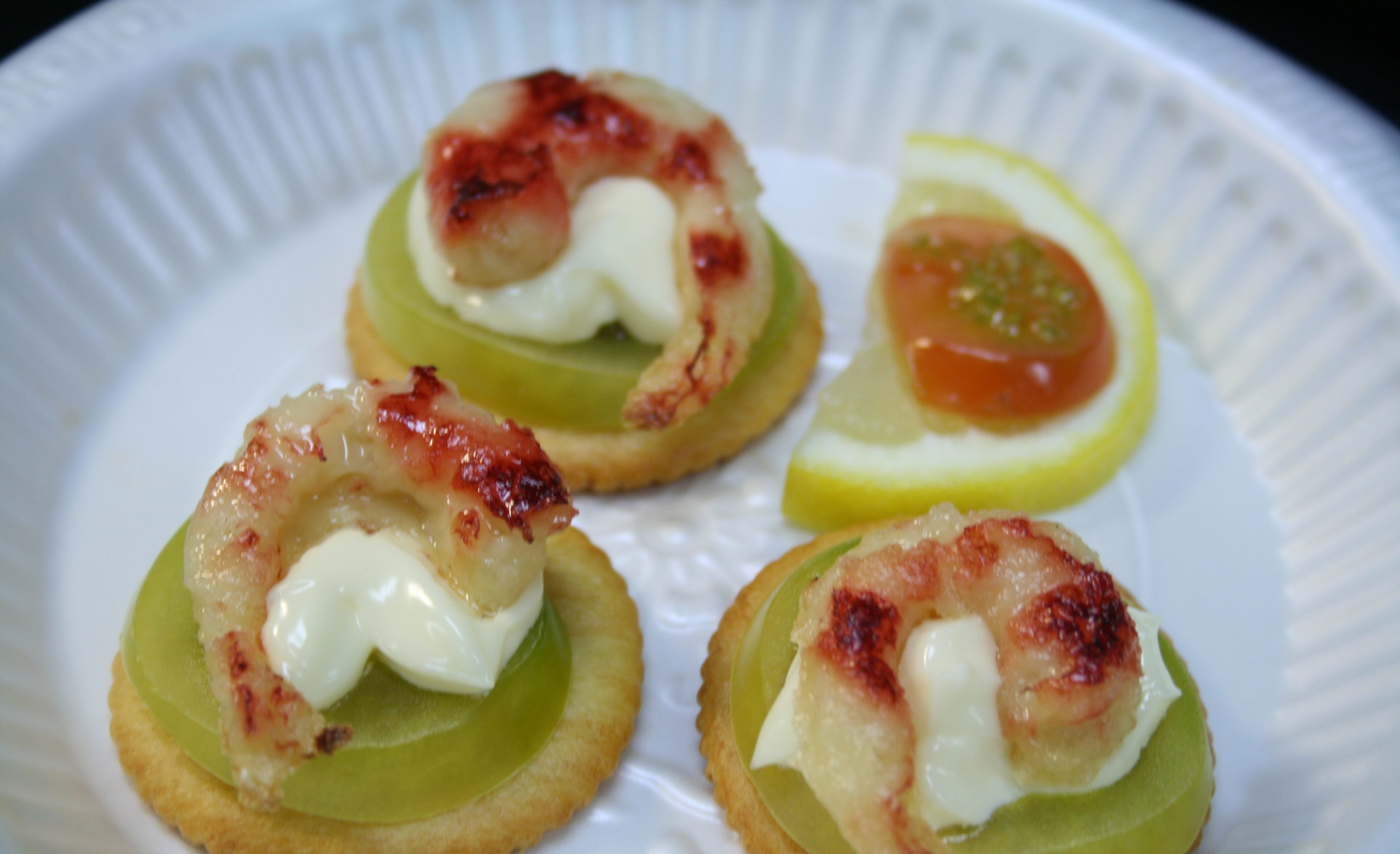 Photo of three prawns on a plate