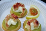 Photo of three prawns on a plate