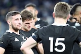 TJ Perenara speaks to his fellow All Blacks as they are beaten by the Wallabies in a Bledisloe Cup Test match.
