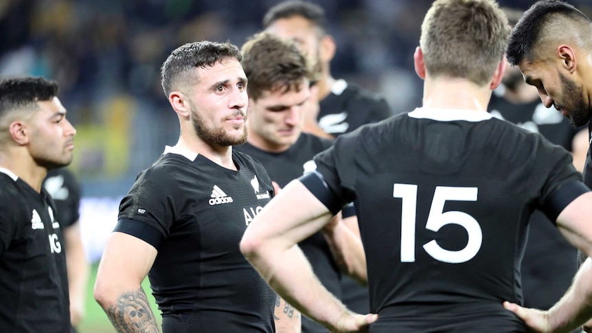 TJ Perenara speaks to his fellow All Blacks as they are beaten by the Wallabies in a Bledisloe Cup Test match.