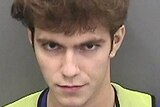 17-year-old Graham Ivan Clark smirks in a mug shot.