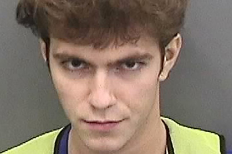 17-year-old Graham Ivan Clark smirks in a mug shot.