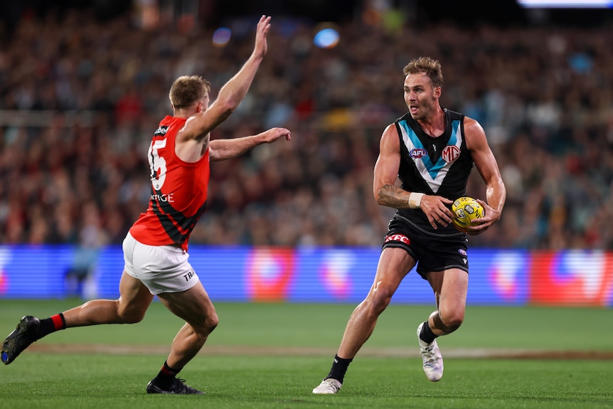 Jeremy Finlayson in action against Essendon