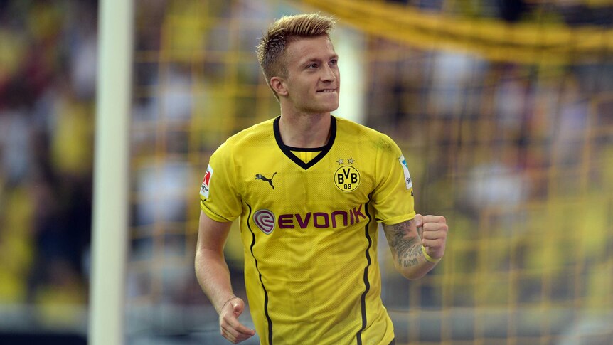 Reus double helps Dortmund to Super Cup win over Bayern