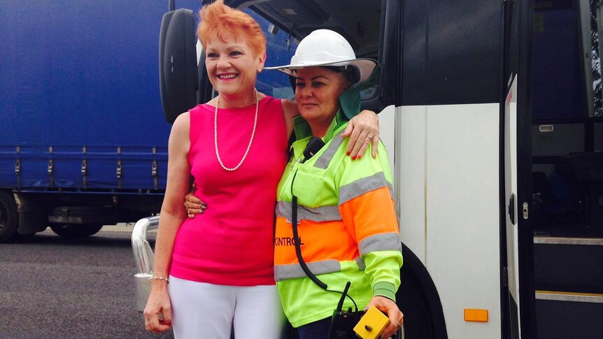 Pauline Hanson poses for a photo with a woman on her regional Queensland tour for election campaign.