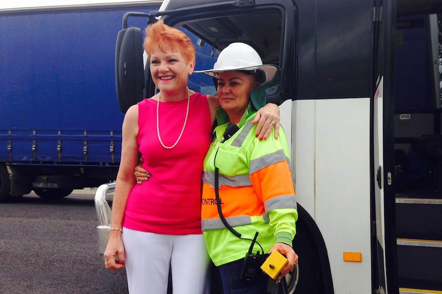 Pauline Hanson poses for a photo with a woman on her regional Queensland tour for election campaign.
