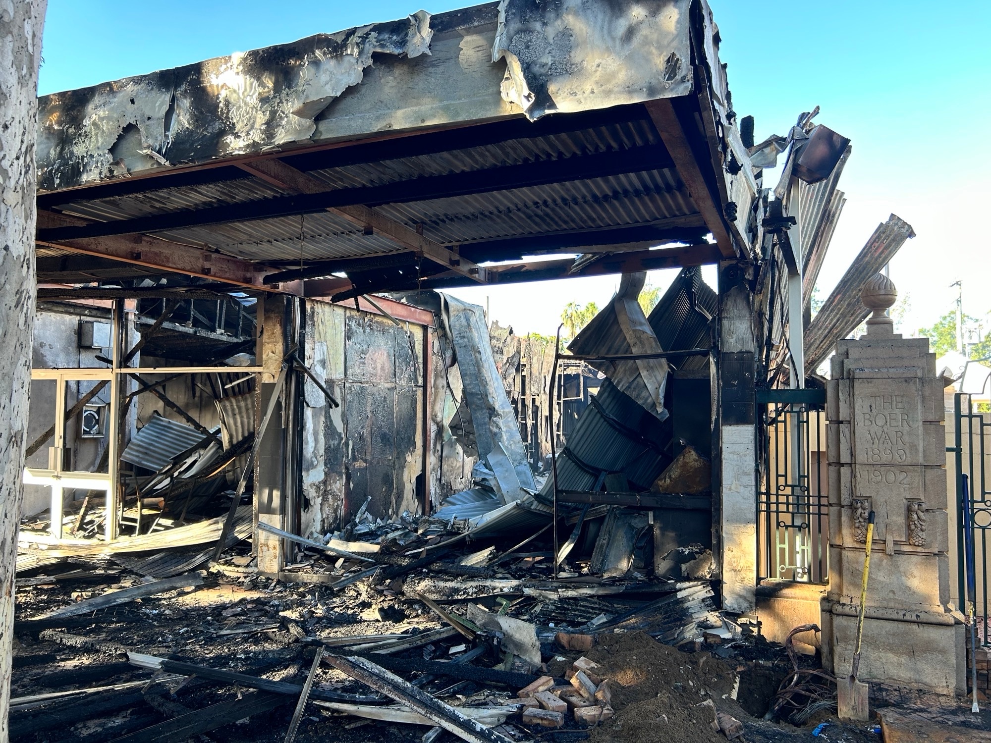 Explosions wake town as suspicious fire rips through shopfronts on