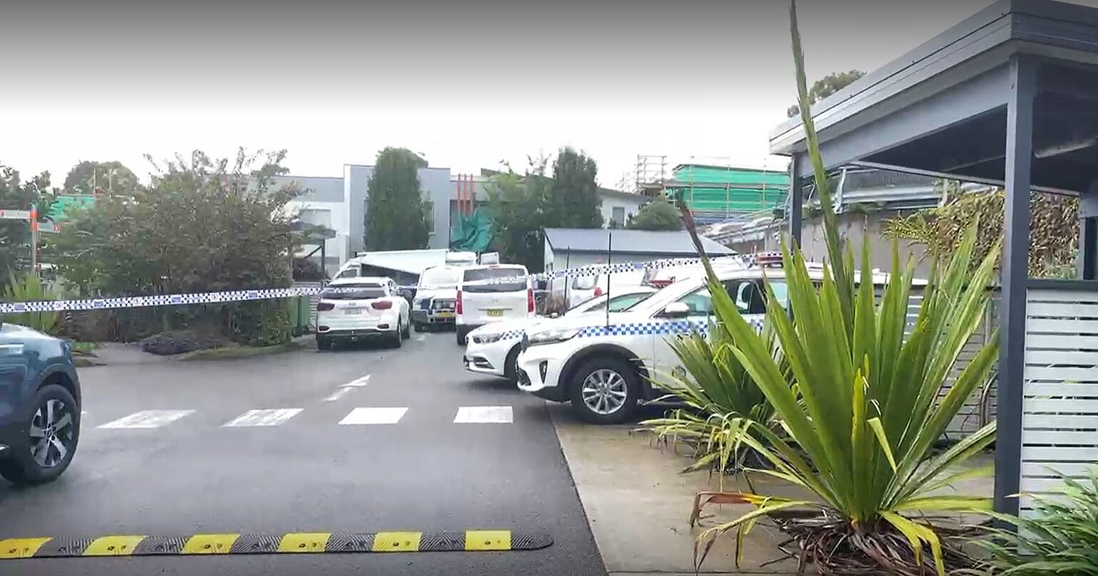 police tape outside a building