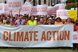 Protesters gather during the National Day of Climate Action rally in Brisbane