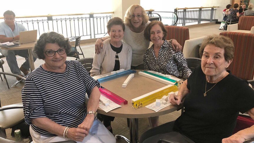 A group of women play mahjong at the Galleria shopping mall in Pittsburgh, Pennsylvania.