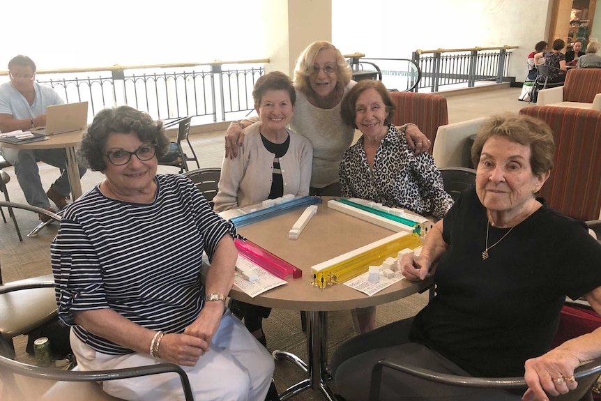 A group of women play mahjong at the Galleria shopping mall in Pittsburgh, Pennsylvania.