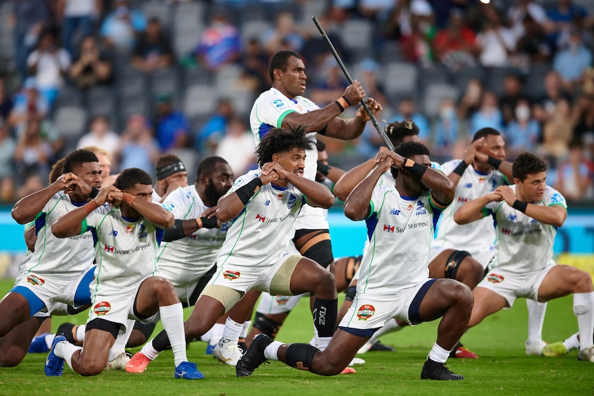 Players from a rugby union team in the Pacific perform a war dance before a game