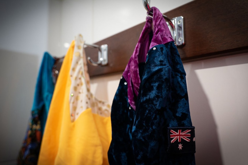 Leotards hanging in a change room