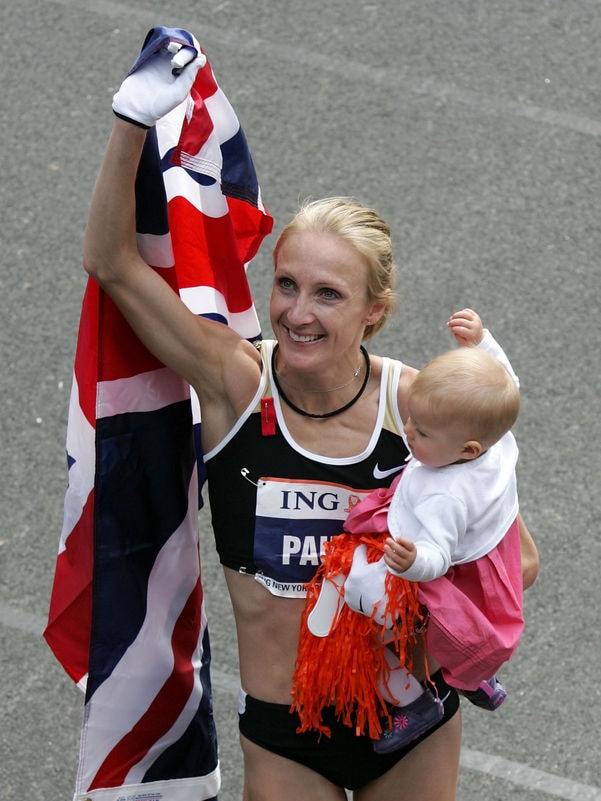 Radcliffe celebrates with her daughter after winning the 2007 New York City Marathon.