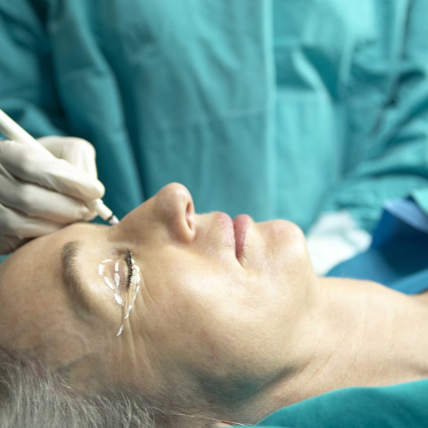 Woman having cosmetic surgery