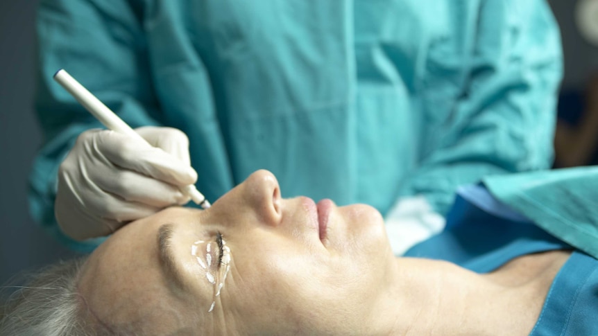 Woman having cosmetic surgery