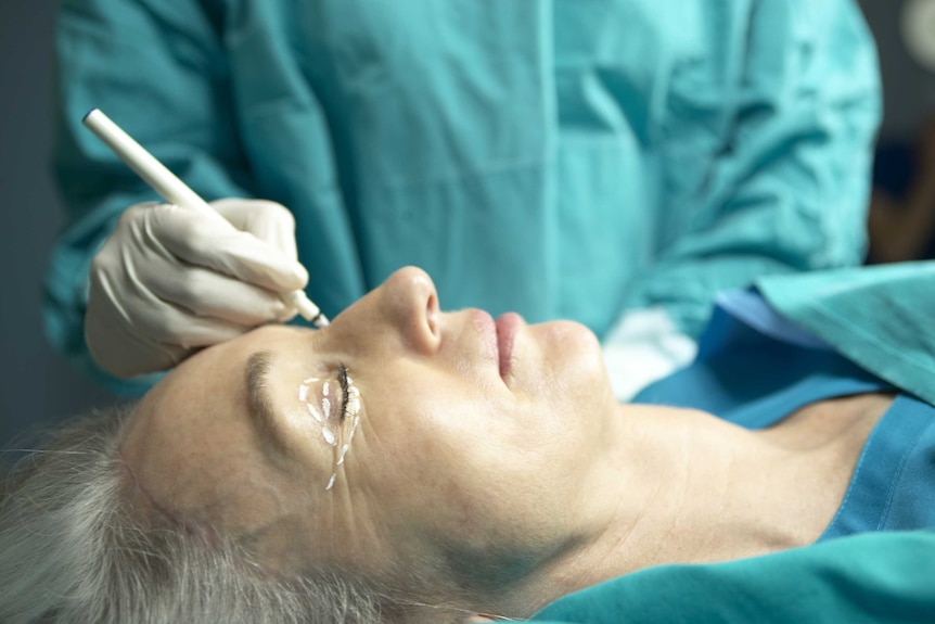 Woman having cosmetic surgery