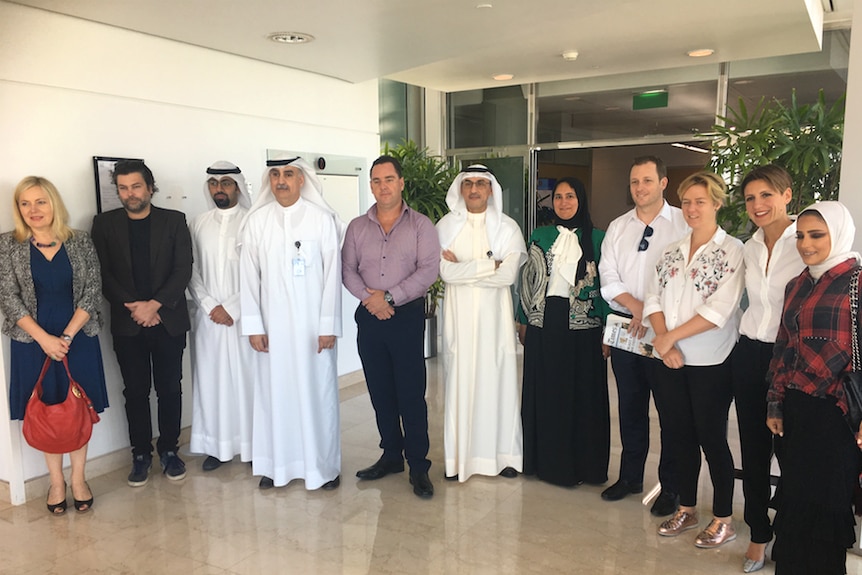 Emma Alberici's delegation to Kuwait with the Executive Director of the Kuwait Petroleum Company, Nizar Al-Adasani.