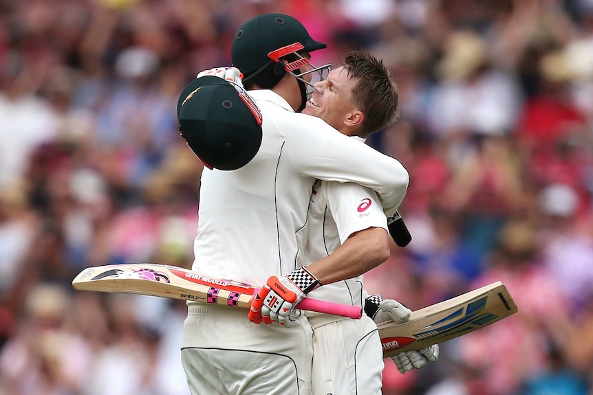 David Warner and Matt Renshaw hug