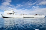 HMAS Choules at anchor off the coast of Bougainville