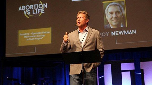 Troy Newman speaks at an event