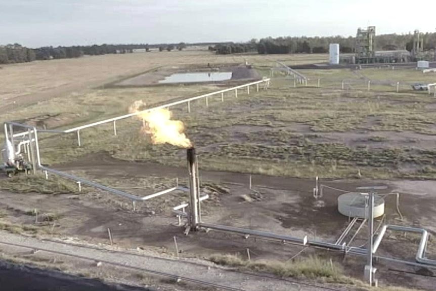 Gas burning at Linc Energy experimental underground coal gasification plant.