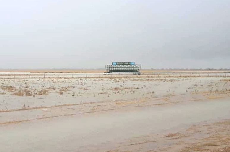 Water on the ground at an outback race track