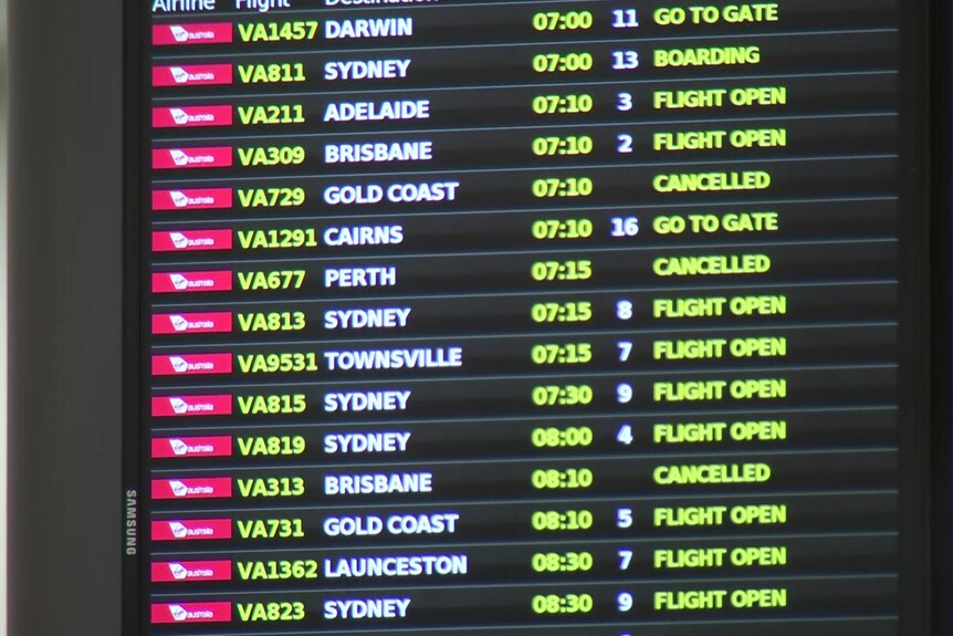 A departure board for Virgin flights showing cancellations to three destinations