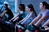Women in a cycling or spin class