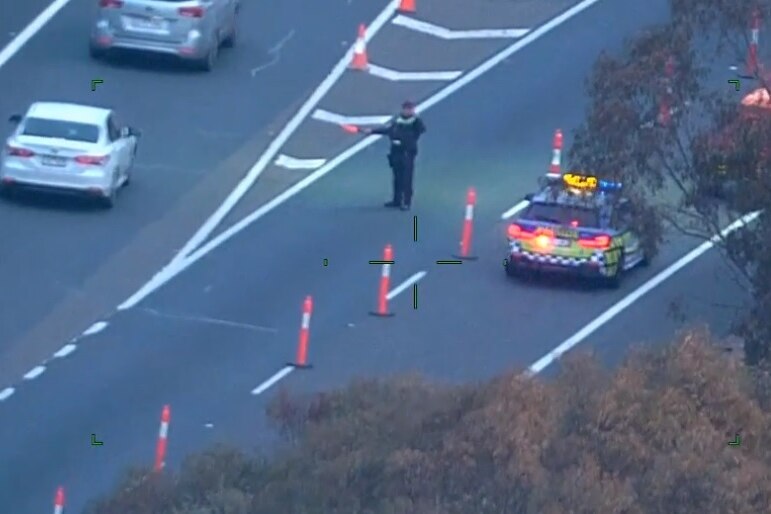 Vision captured from a Victoria Police helicopter shows a road border checkpoint