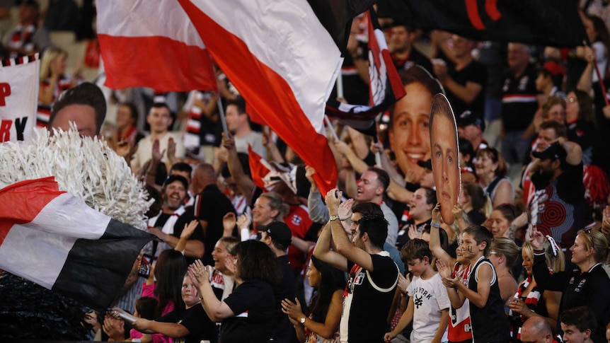 St Kilda fans celebrate a win over Melbourne during round 5 of the 2019 AFL season at at Docklands.