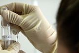 A technician works at an anti-doping laboratory