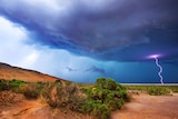 Stormy clouds gather and lightning strikes in Kalgoorlie, WA.