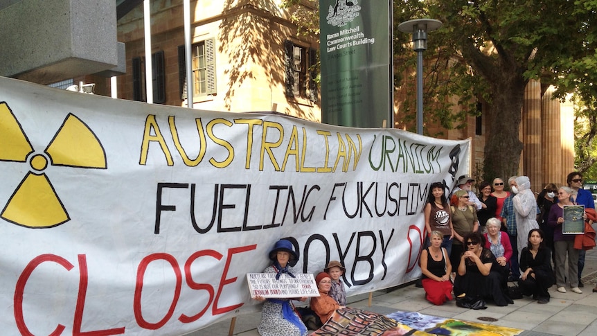 Protesters showed support for Kevin Buzzacott outside the Federal Court