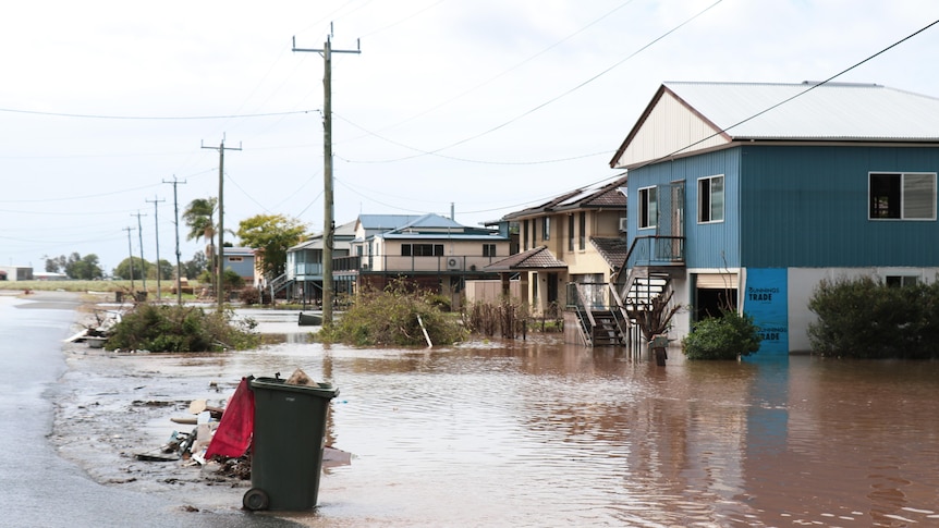 Floodwater around houses in Woodburn on the north coast