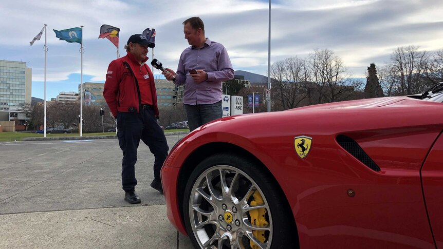 Joel Rheinberger interviews Nino Bocchino next to his beloved Ferrari.