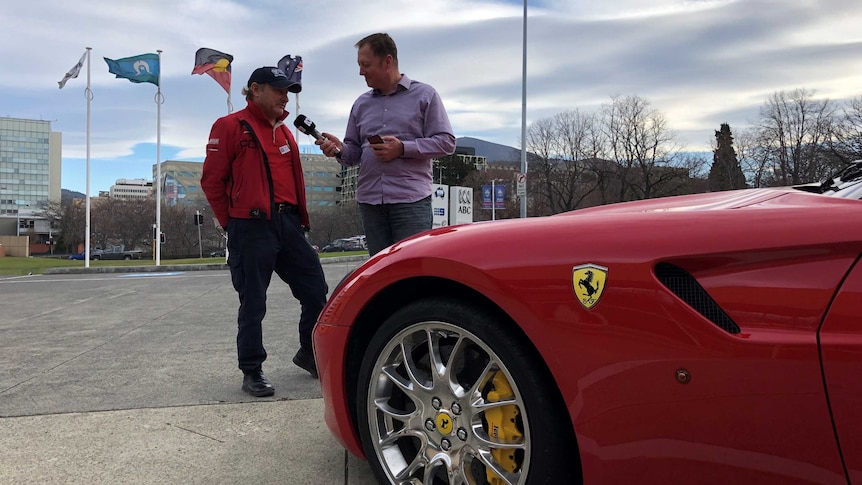 Joel Rheinberger interviews Nino Bocchino next to his beloved Ferrari.